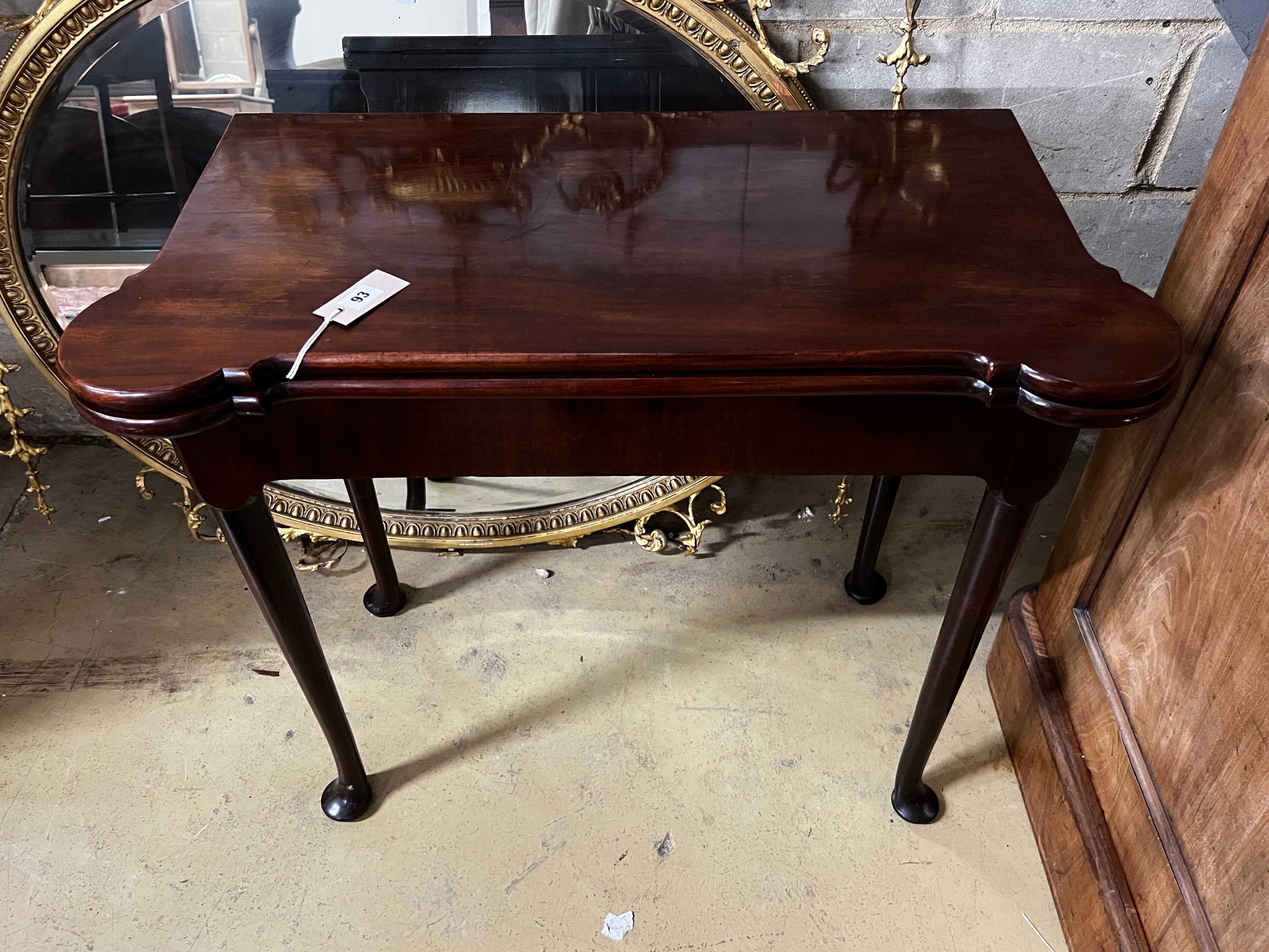 A George III mahogany folding card table, width 83cm, depth 42cm, height 73cm